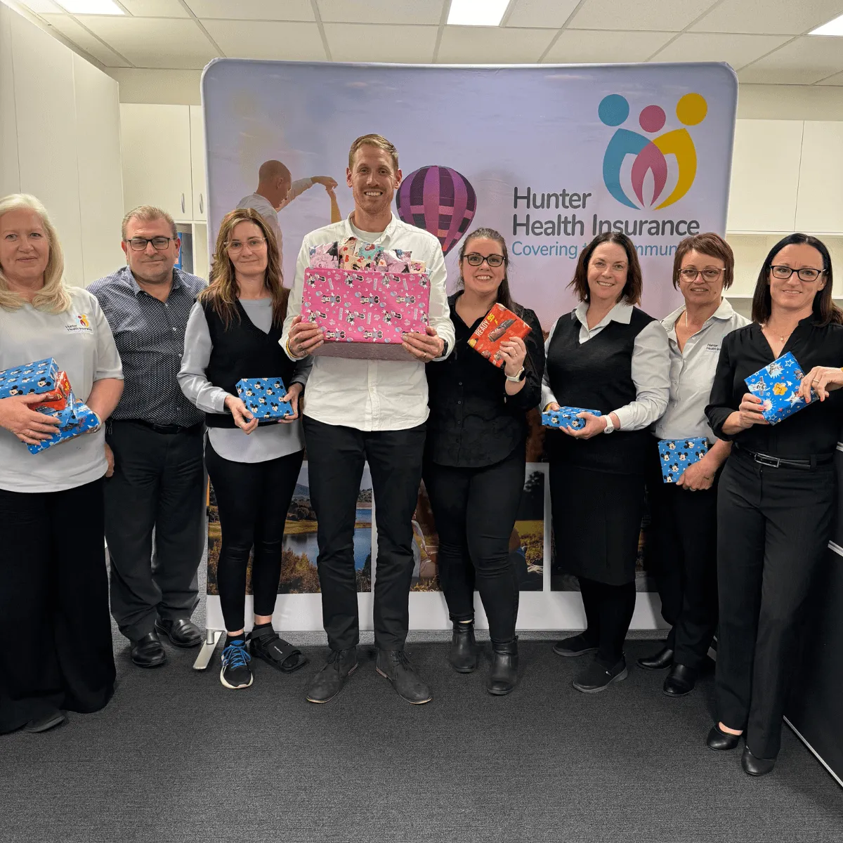 Hunter HI and Little WIngs teams with gift wrapped presents